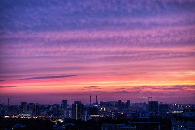 Cityscape against sky during sunset