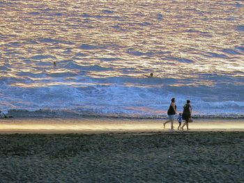 Woman standing at seaside