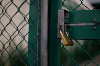 Close-up of lock on iron gate