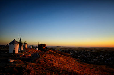 High angle view of buildings against sky during sunset