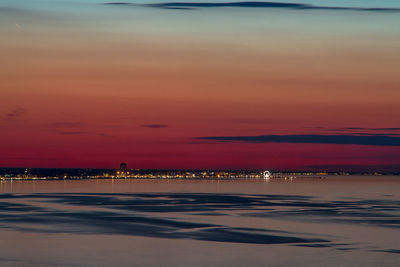 Scenic view of beach against sky during sunset