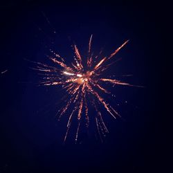 Low angle view of firework display