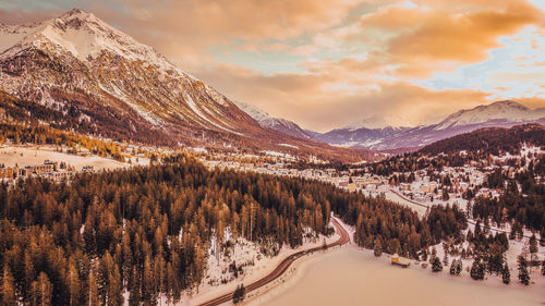 Scenic view of snowcapped mountains against sky during winter