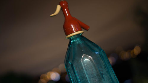 Close-up of red wine bottle