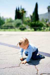 Full length of cute baby on road