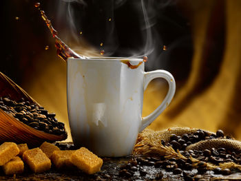 Close-up of coffee cup on table