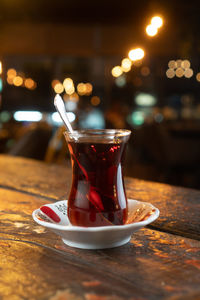 Close-up of wineglass on table