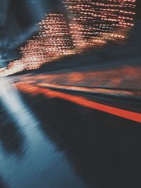 High angle view of illuminated road at night