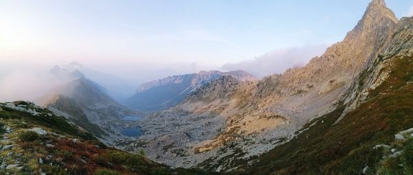 Panoramic view of mountain range against sky