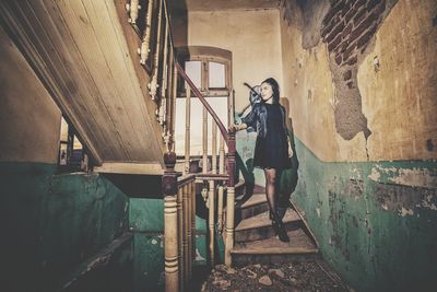 Woman in abandoned building