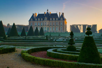 View of historical building in garden