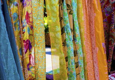 Full frame shot of multi colored umbrellas hanging at market