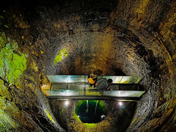 High angle view of people in cave