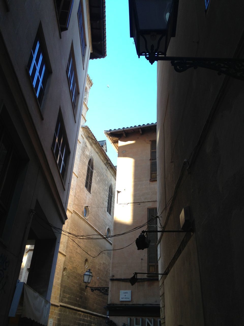 LOW ANGLE VIEW OF RESIDENTIAL BUILDINGS AGAINST SKY