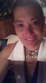 Close-up portrait of a smiling young woman