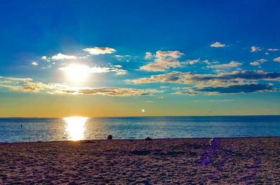 Scenic view of sea at sunset