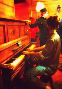 Young woman playing guitar