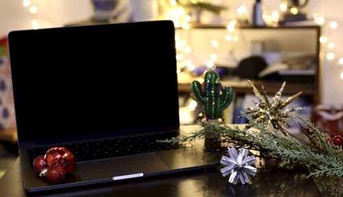 Close-up of christmas decorations on table