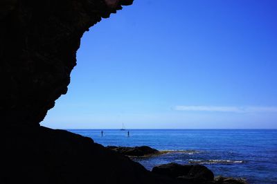 Scenic view of sea against blue sky