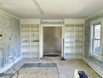 Low section of man standing in building