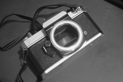 Close-up of camera on table