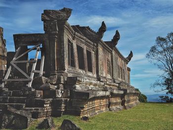 Low angle view of old ruin against sky