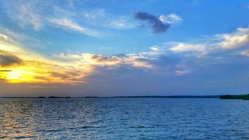 Scenic view of sea at sunset