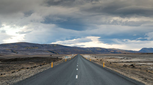 Dramatic volcanic landscape in mountains with winding road