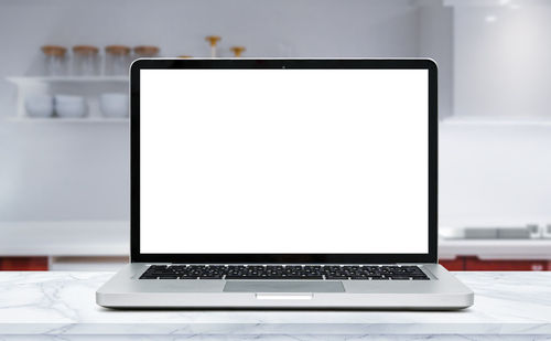 Low angle view of laptop on table