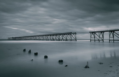 Abandoned pier in black and white. 