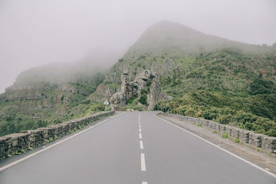 Road leading towards mountains