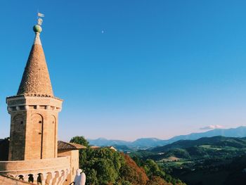 Tower of building against blue sky