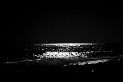 Scenic view of sea at night