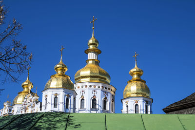 Low angle view of building against blue sky