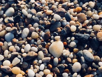 Full frame shot of pebble stones at beach