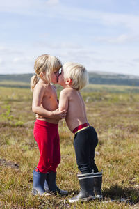 Boy and girl kissing