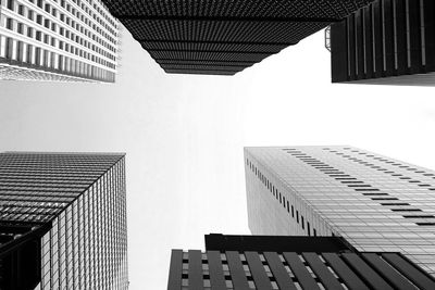 Low angle view of modern buildings against clear sky