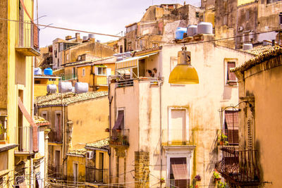 Low angle view of residential buildings in city