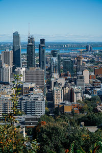 High angle view of buildings in city against sky