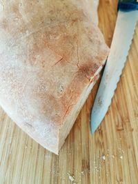 High angle view of bread on cutting board