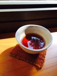 Close-up of coffee cup on table