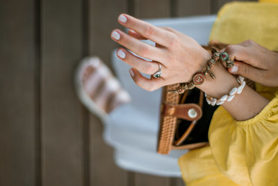 Close-up of woman holding hands