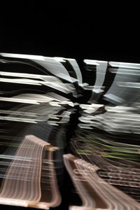 Close-up of feather against black background