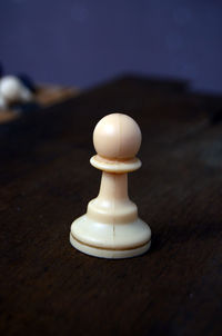 Close-up of white wooden table