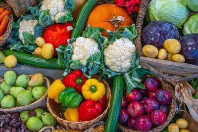 Different kinds of vegetables and fruits for sale on a market