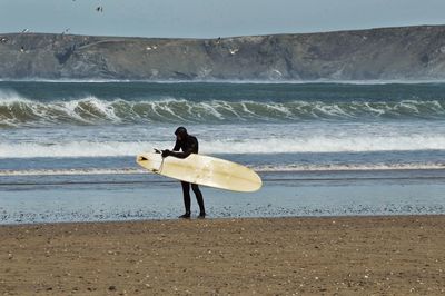 Surfer..board and the beach