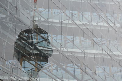 Low angle view of man working at construction site