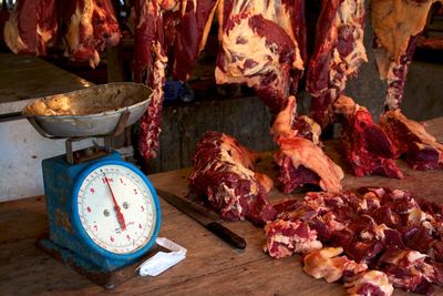 View of meat and old fashioned scale