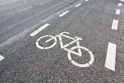 High angle view of bicycle sign road