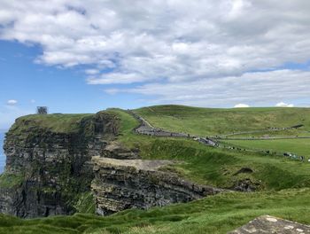 Scenic view of land against sky